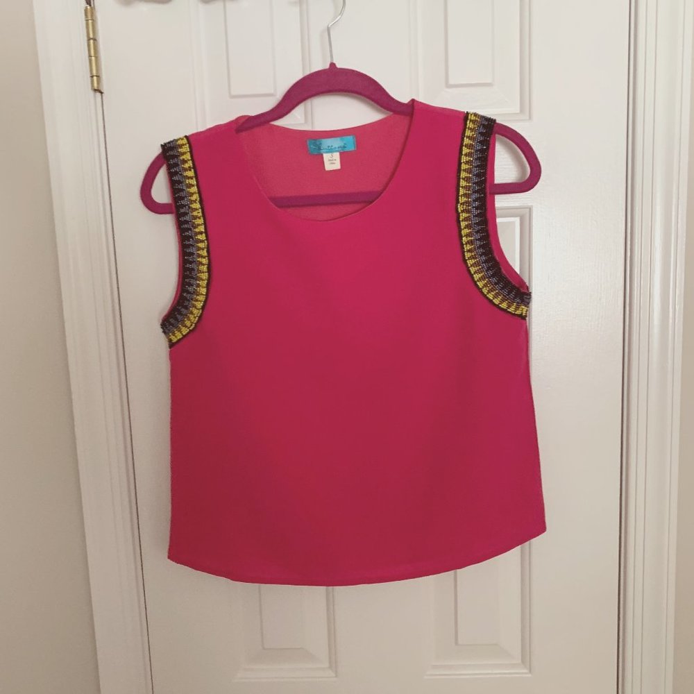 Bright pink top with beading detail